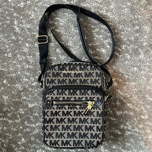 Michael Kohrs crossbody bag (purse) in mint condition.